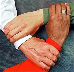 People holding hands for support
